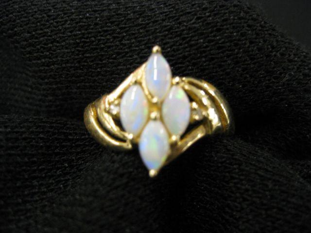 Appraisal: Opal Ring four fiery marquise gems in k yellow gold