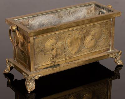 Appraisal: A brass rectangular jardini re the sides repouss decorated with