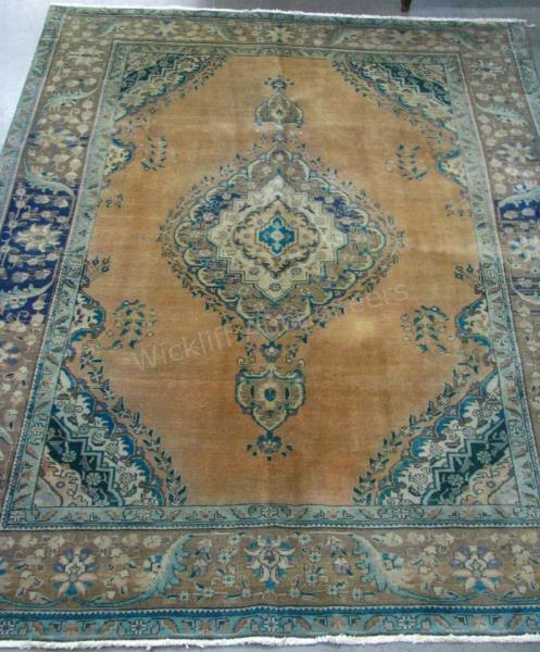 Appraisal: Antique Handmade Oriental Room Size Rug Tabriz design brown field