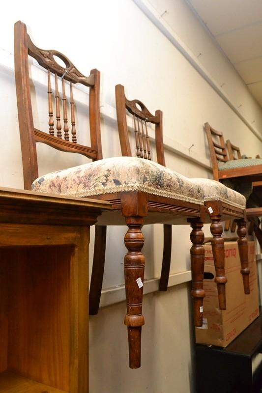 Appraisal: A PAIR OF EDWARDIAN SPINDLE BACK CHAIRS PAIR OF SPINDLE