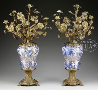 Appraisal: PAIR OF PORCELAIN AND GILT METAL CANDELABRUM rd quarter th