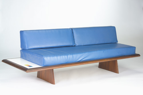 Appraisal: SAMSON BERMAN Walnut daybed with royal blue vinyl cushions and