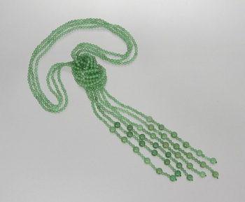 Appraisal: Three Strands of Green Jade Beads Three strands of jade