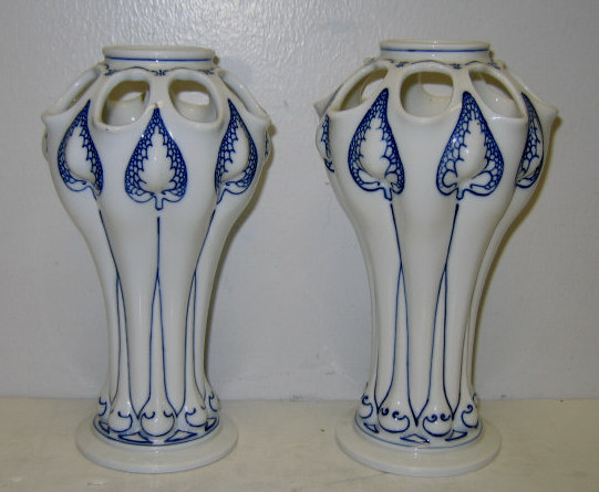 Appraisal: PAIR OF MEISSEN PORCELAIN VASES Art Nouveau floriform with pierced