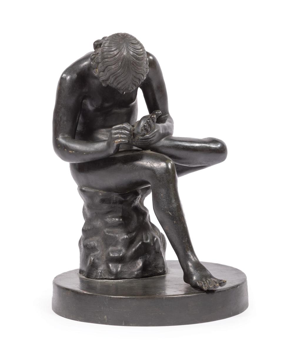 Appraisal: Patinated Bronze Figure of Seated Young Man th c after