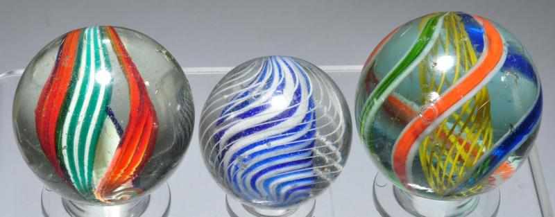 Appraisal: Lot of Large Swirl Marbles Description Largest is a yellow