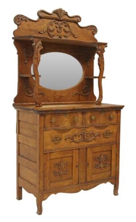 Appraisal: American oak sideboard c carved shell and foliate crest medial