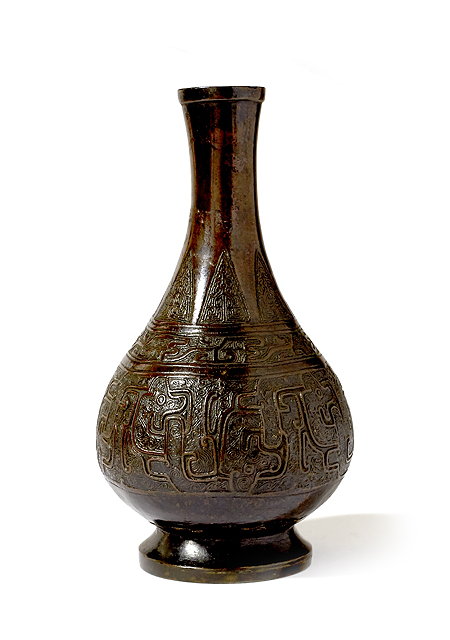 Appraisal: A Chinese bronze vaseMing Dynasty - decorated with archaic motifs