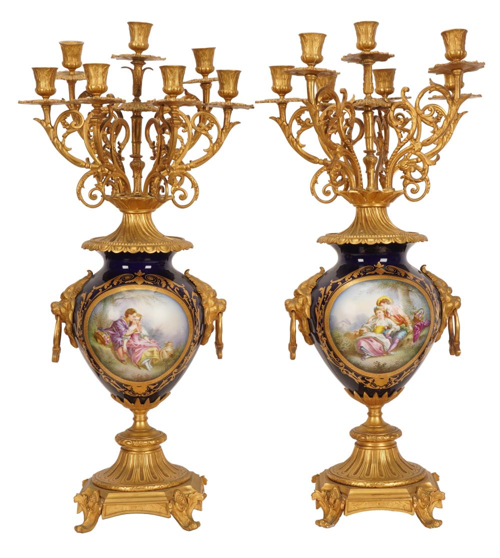 Appraisal: PAIR OF PORCELAIN GILT BRONZE CANDELABRAno visible marks each Sevres-style