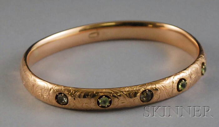 Appraisal: Art Nouveau Etched kt Gold and Peridot Bangle two stones