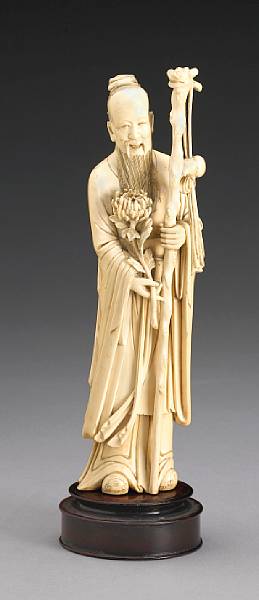 Appraisal: An ivory carving of a bearded sage th Century The