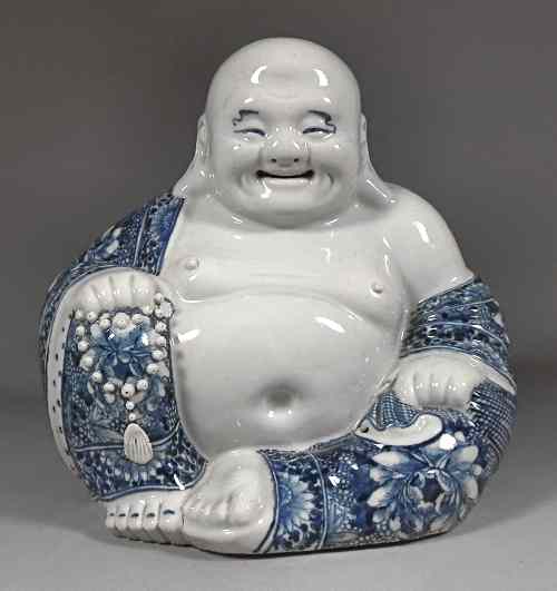 Appraisal: A Chinese blue and white porcelain figure of a seated