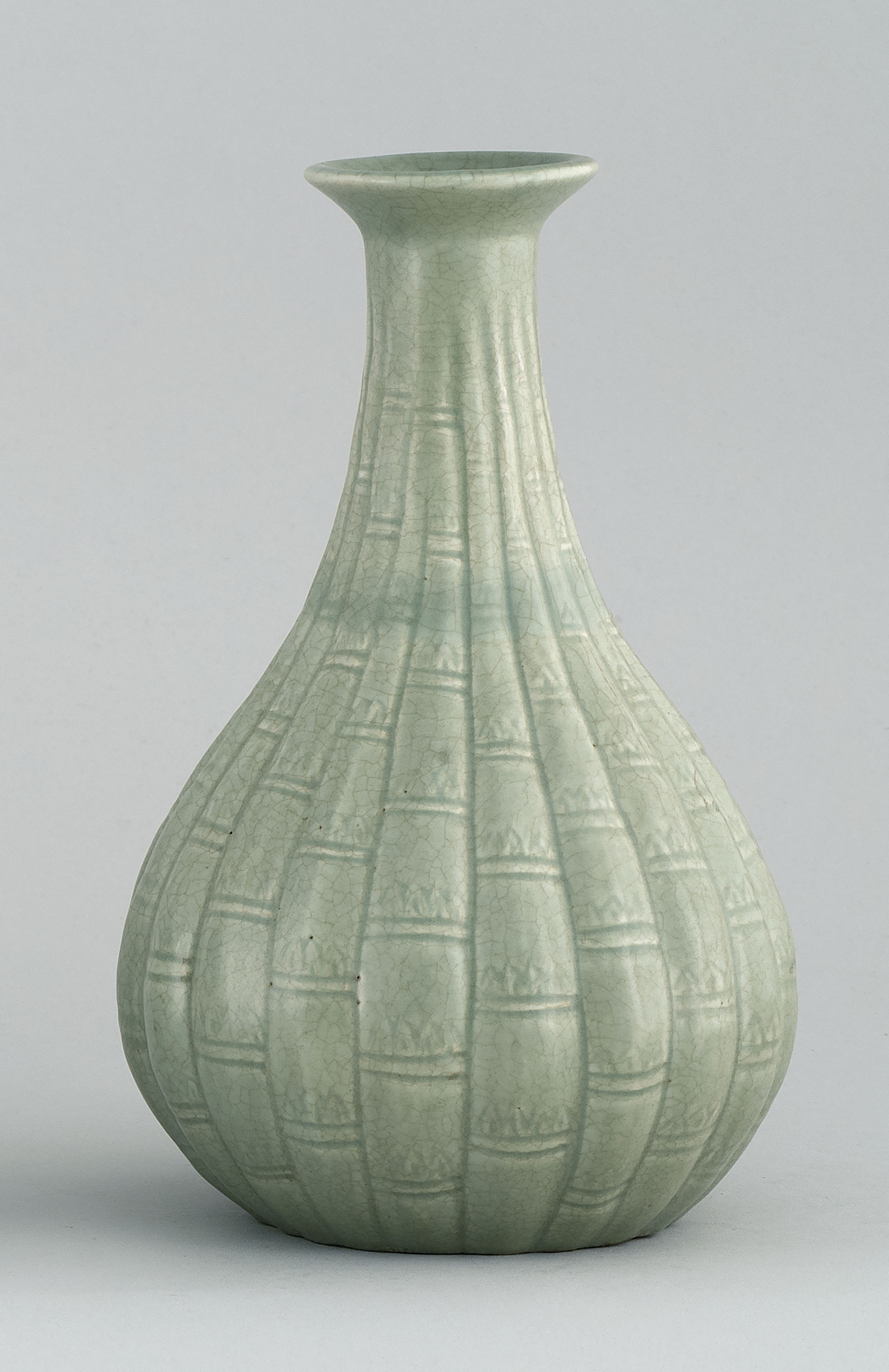 Appraisal: RIBBED CELADON PORCELAIN VASE th CenturyIn pear shape with trumpet