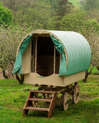 Appraisal: A child's gypsy bow-top caravan with a canvas roof the