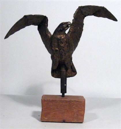 Appraisal: Eagle gilt and metal on wooden stand Height in