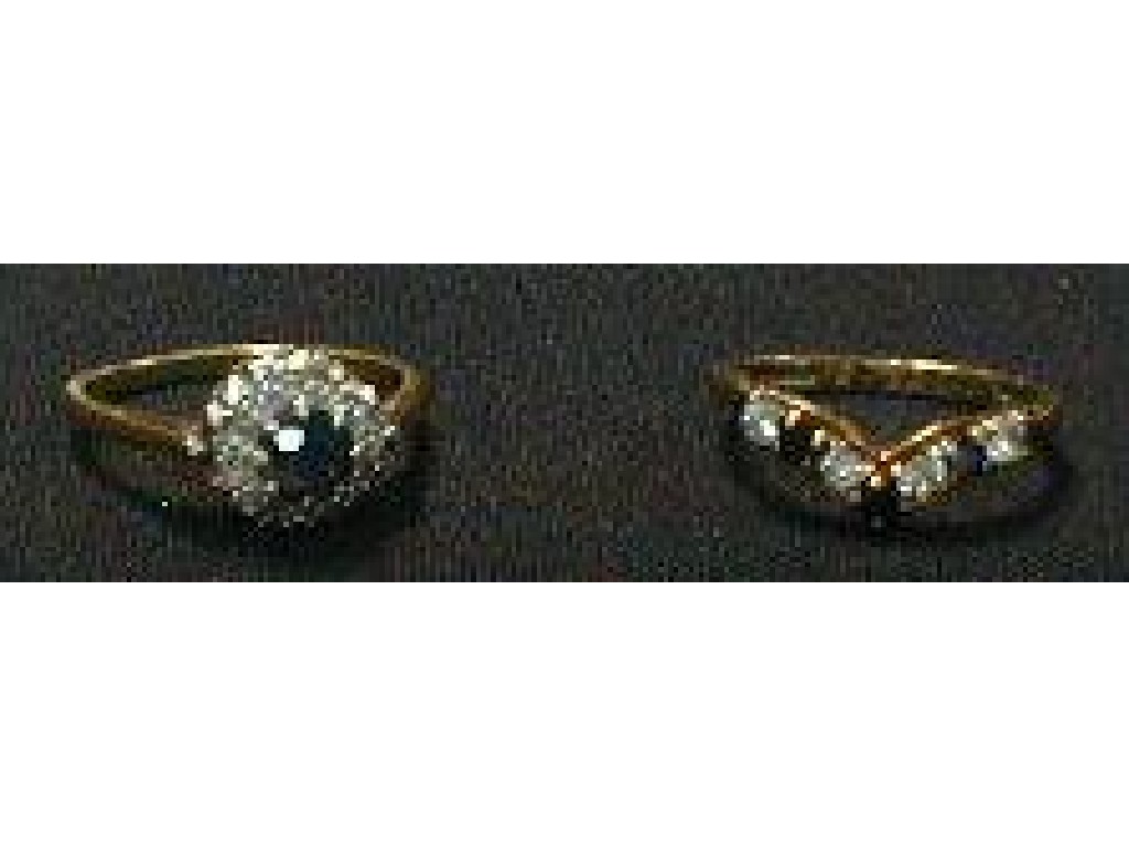 Appraisal: An ct gold diamond and sapphire cluster ring together with