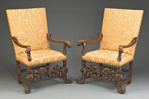 Appraisal: A pair of Italian Baroque walnut armchairs late th early