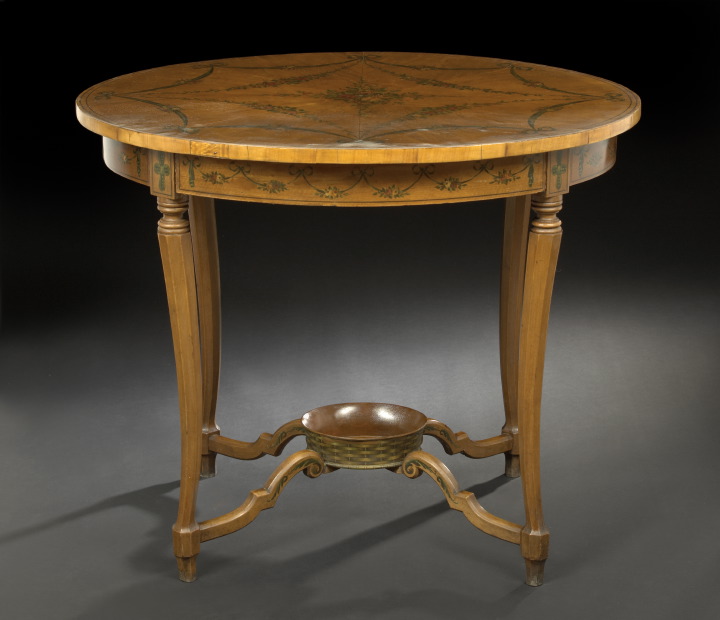 Appraisal: Edwardian Satinwood Center Table ca the oval top with sunburst