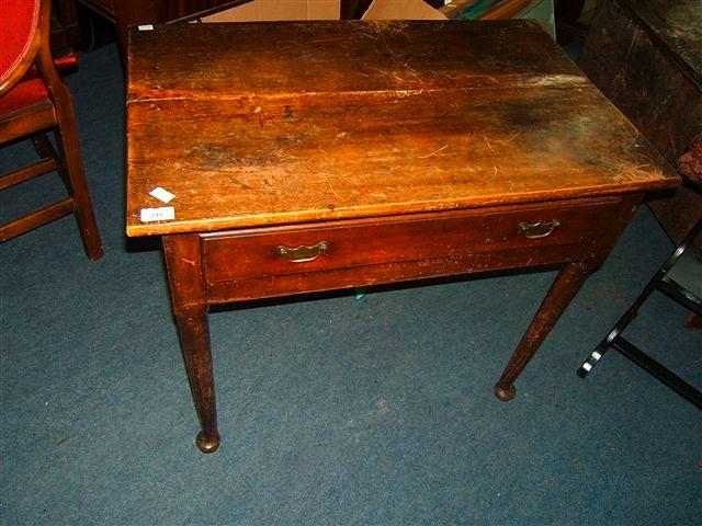 Appraisal: An antique mahogany side table with single drawer standing on