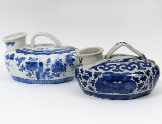 Appraisal: TWO PORCELAIN CHAMBER VESSELS Chinese One blue and white the