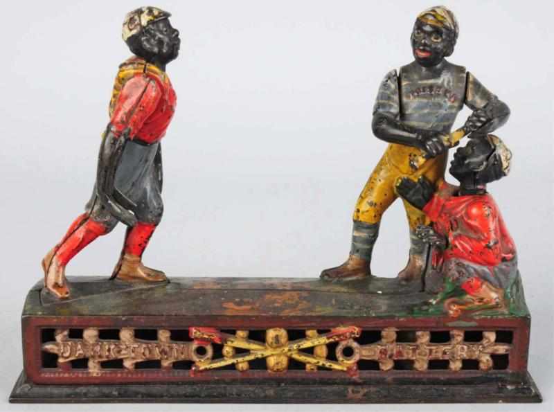 Appraisal: Cast Iron Darktown Battery Mechanical Bank Manufactured by J E