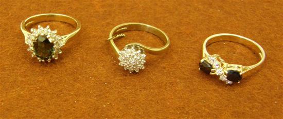 Appraisal: Three gold rings comprising an oval sapphire and diamond cluster