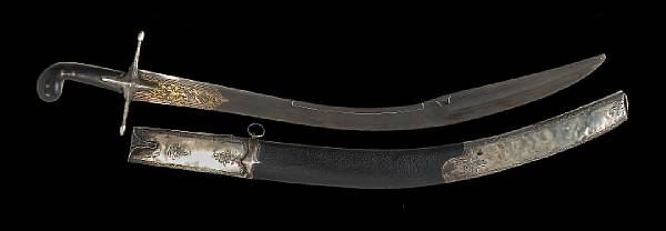 Appraisal: An Ottoman silver-mounted kilij th century Broad curved inch blade