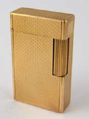 Appraisal: A gold plated Dupont Paris cigarette lighter approx x cm