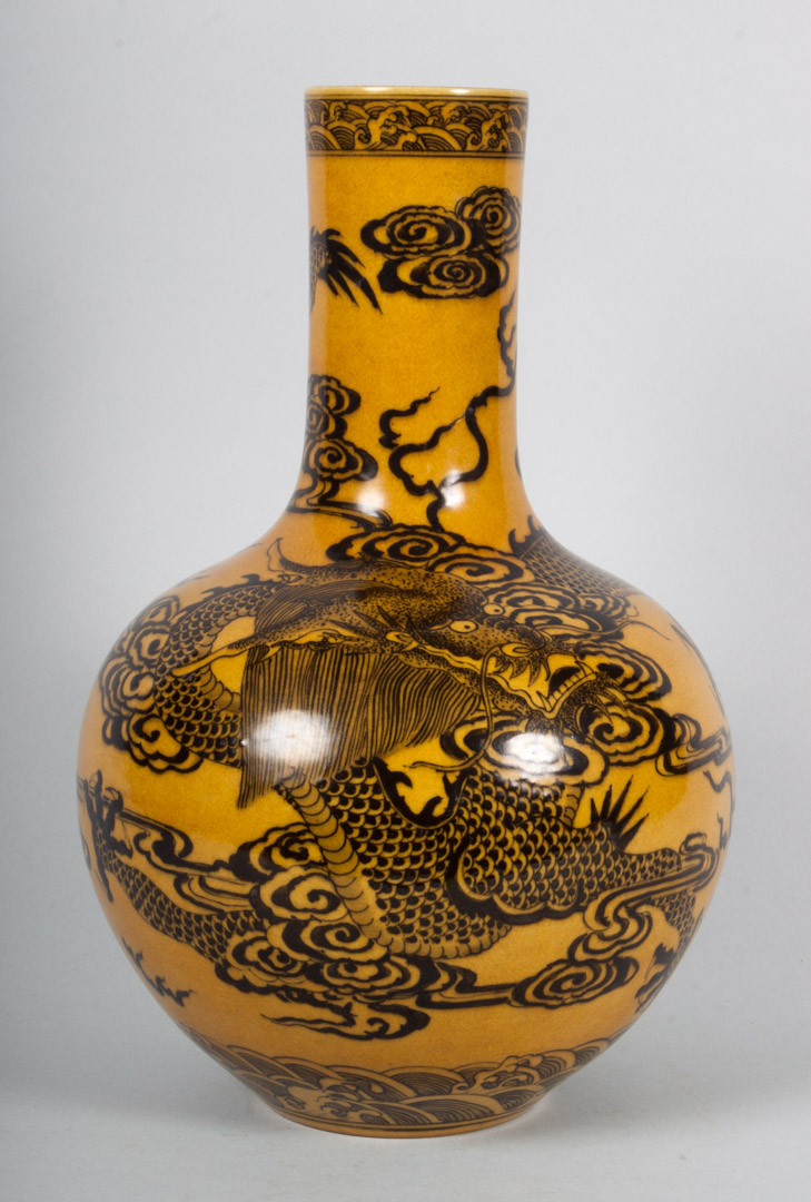 Appraisal: Chinese porcelain bottle-form vase yellow ware vase with black dragon