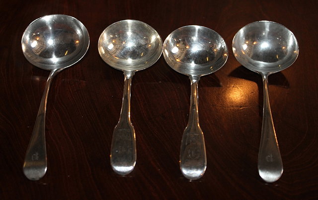 Appraisal: TWO PAIRS OF GEORGIAN SILVER SAUCE LADLES one Old English