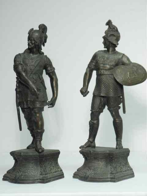 Appraisal: Two classical standing soldier sculptures White metal base with a