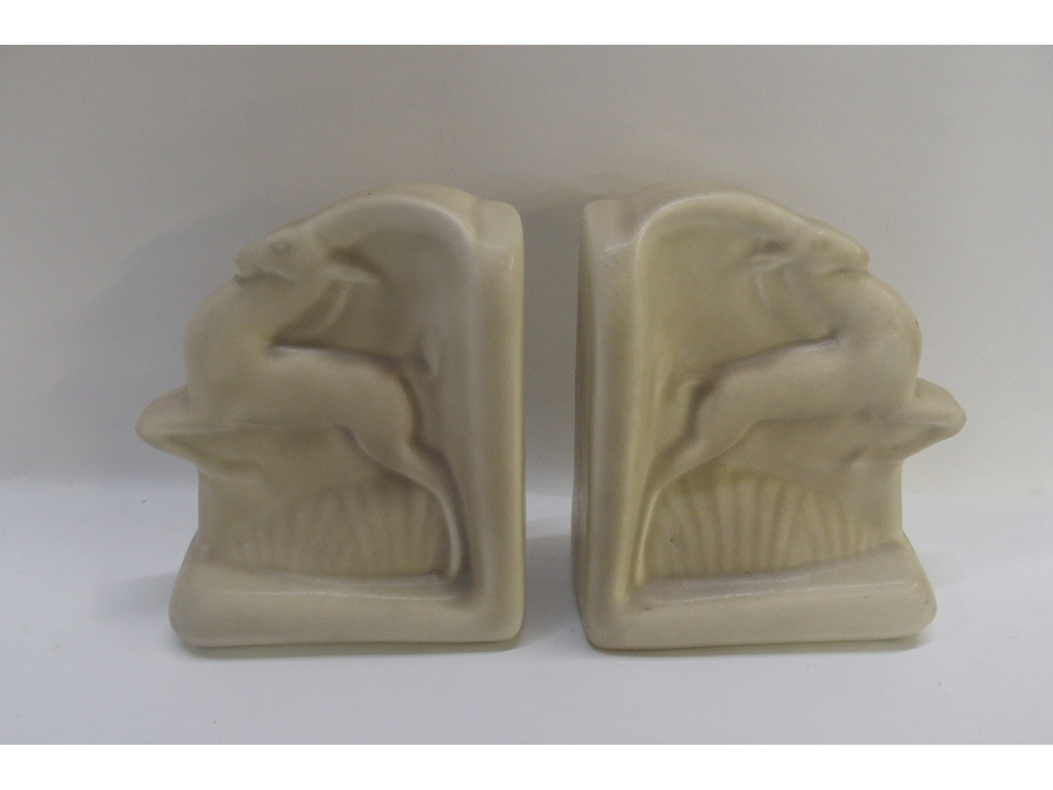 Appraisal: Pair of Pilkingtons Royal Lancastrian Art Deco bookends modelled as