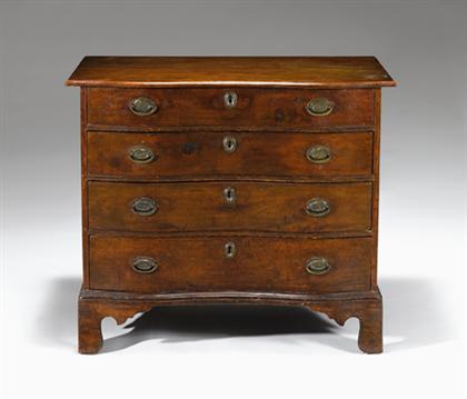 Appraisal: Chippendale mahogany oxbow chest of drawers new england late th