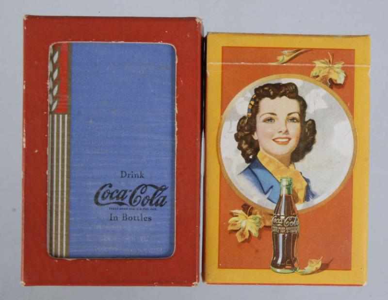 Appraisal: Lot of Coca-Cola Card Decks Description Includes Autumn Girl with