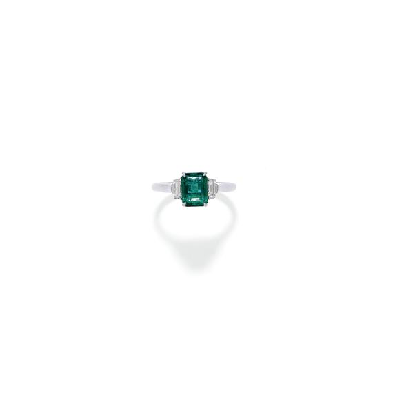 Appraisal: EMERALD AND DIAMOND RING Platinum Fine classic ring the top