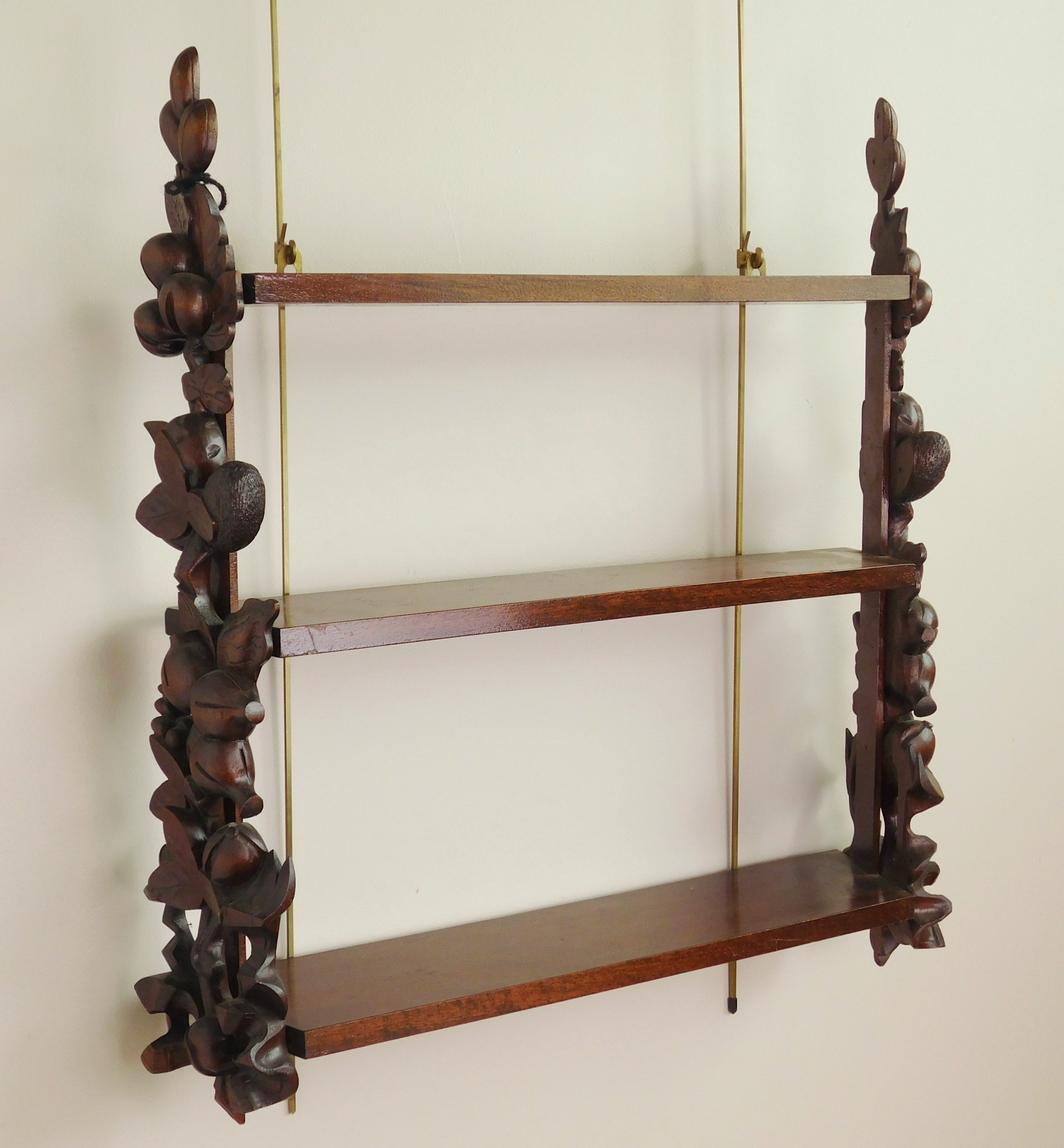 Appraisal: Victorian hanging shelf with shelves with heavily carved ends x