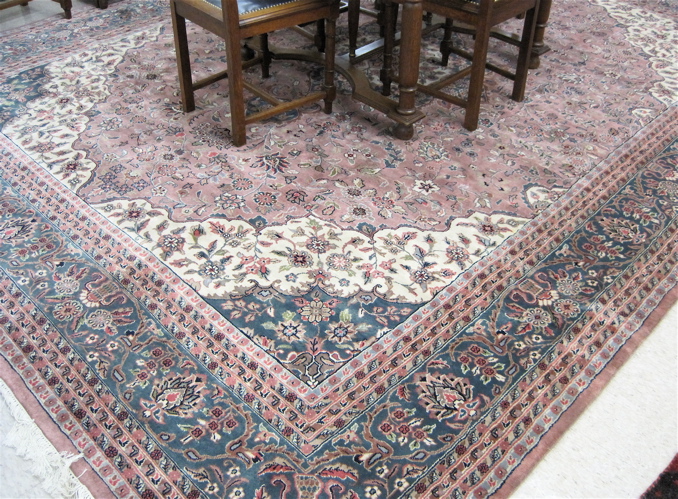 Appraisal: HAND KNOTTED ORIENTAL CARPET Indo-Kashan floral and central floral medallion