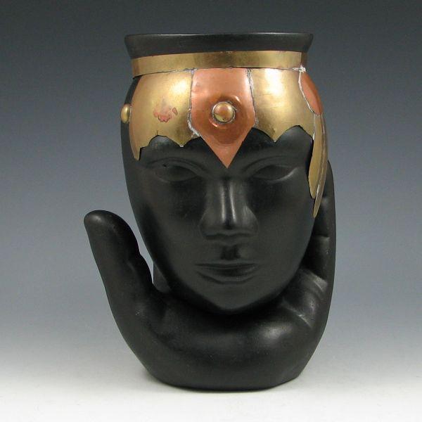 Appraisal: African them pottery head vase with applied metal which sits