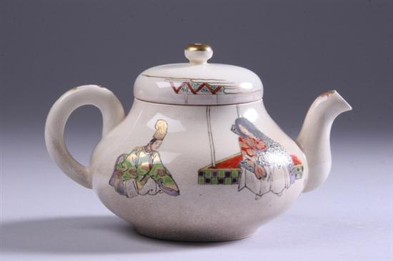 Appraisal: JAPANESE SATSUMA EARTHENWARE TEAPOT Meiji period Painted to depict a