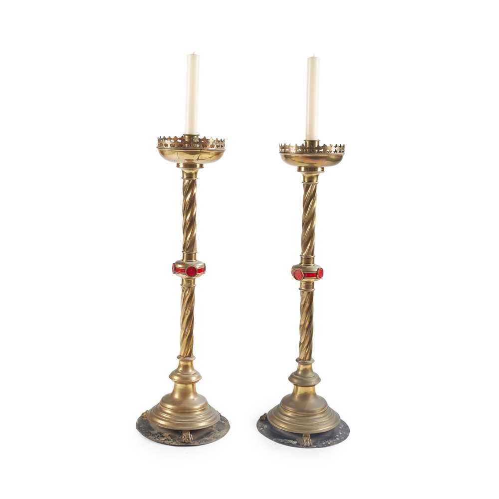 Appraisal: ENGLISH PAIR OF GOTHIC REVIVAL ALTAR CANDLESTICKS CIRCA brass raised