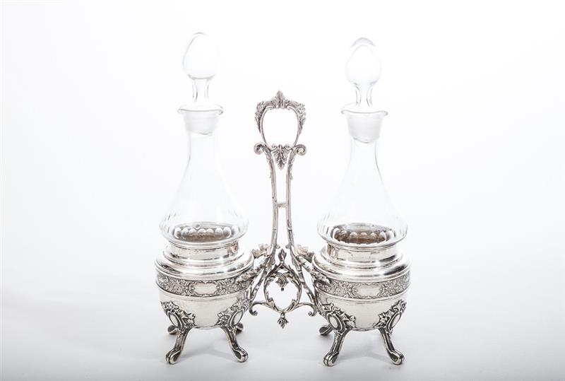 Appraisal: Continental Silver Cruet Stand and Two Cut-Glass Cruets and Stoppers