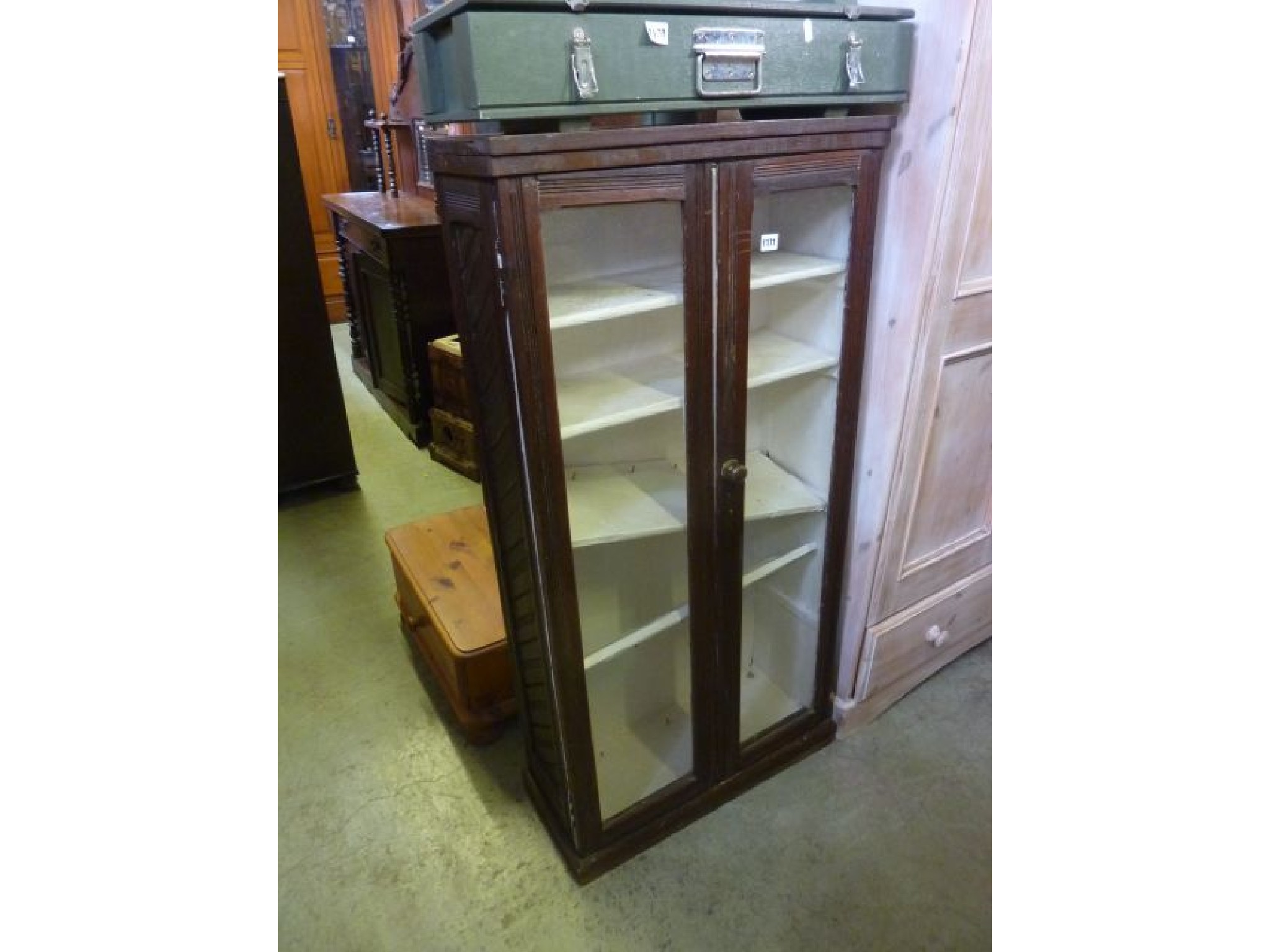 Appraisal: A small Victorian oak bookcase with reeded framework and painted