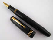 Appraisal: A Swan Mabie Todd fountain pen in black side lever