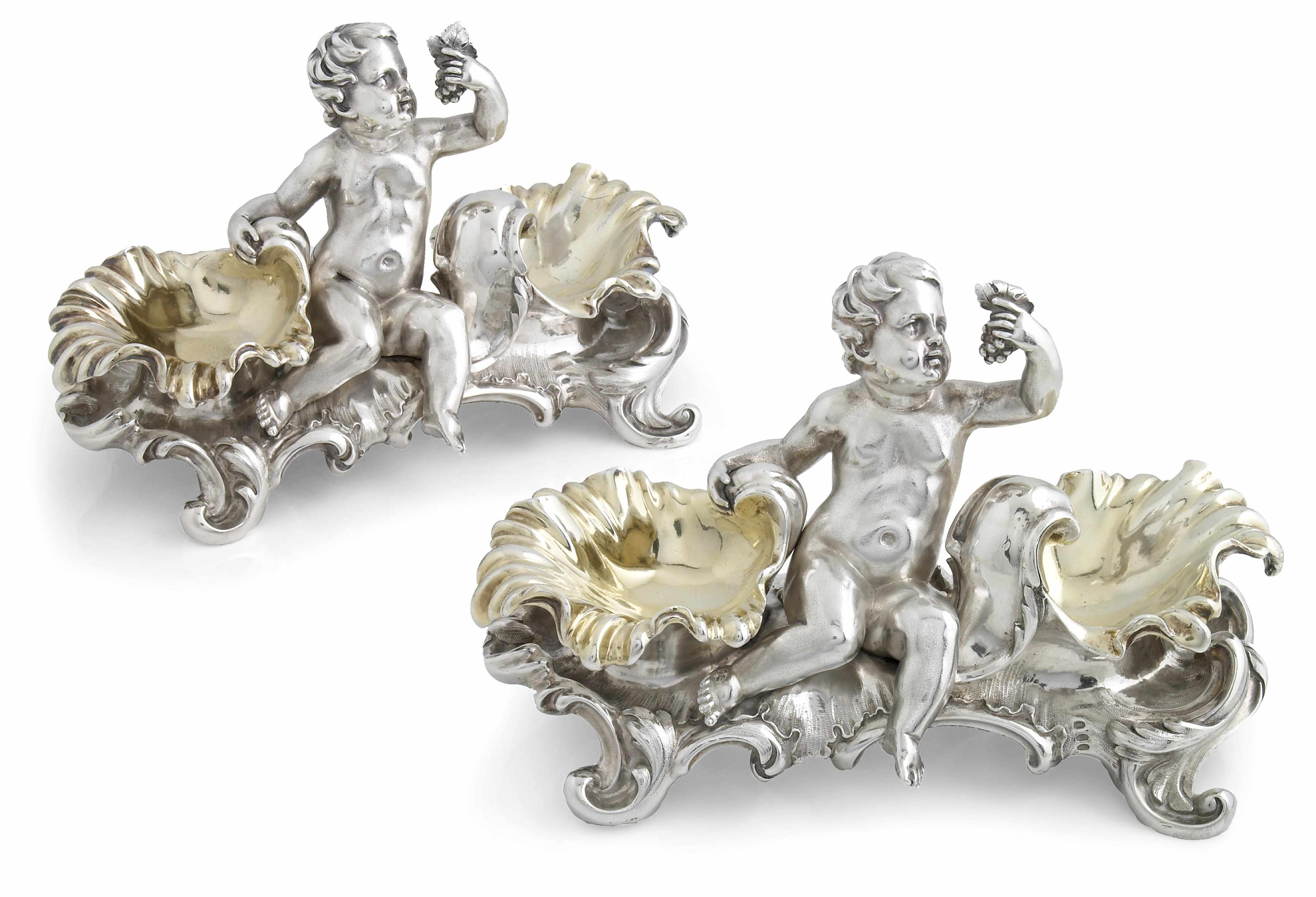 Appraisal: A Victorian silver pair of figural double salt cellars Mortimer