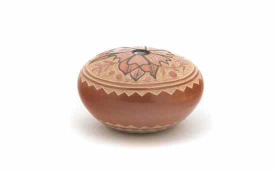 Appraisal: A Jemez Redware Miniature Seed Jar with sgraffito corn flower