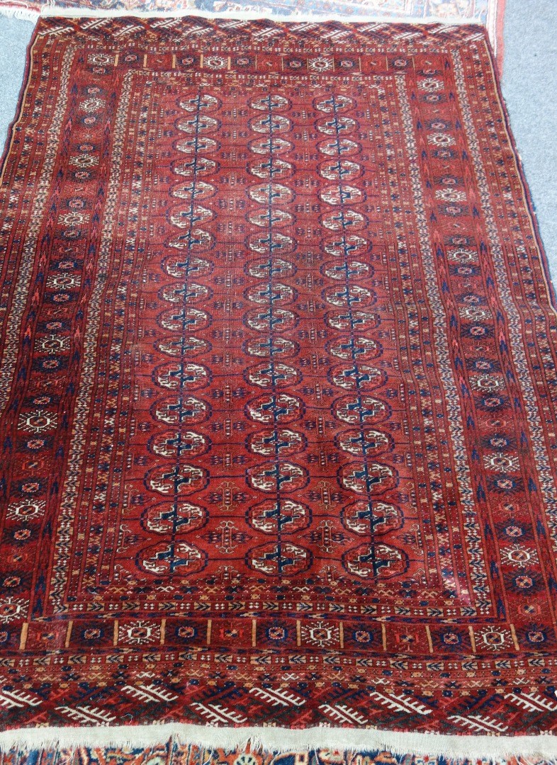 Appraisal: A Tekke Turkman rug the madder field with three columns