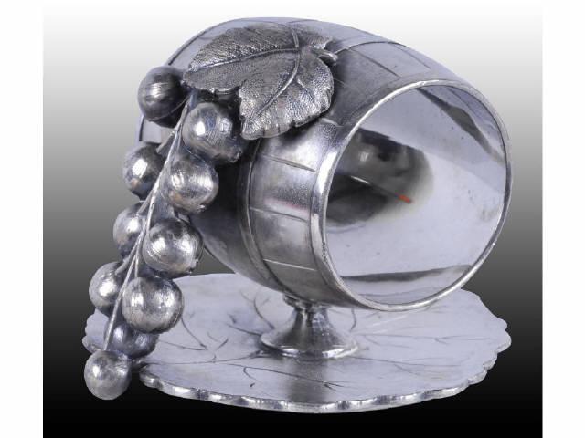 Appraisal: Grapes Cascade Over Barrel Figural Napkin Ring Description Leaf base