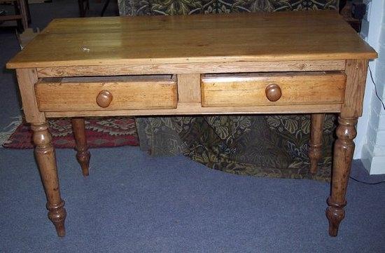 Appraisal: A pine table fitted two drawers on turned legs cm