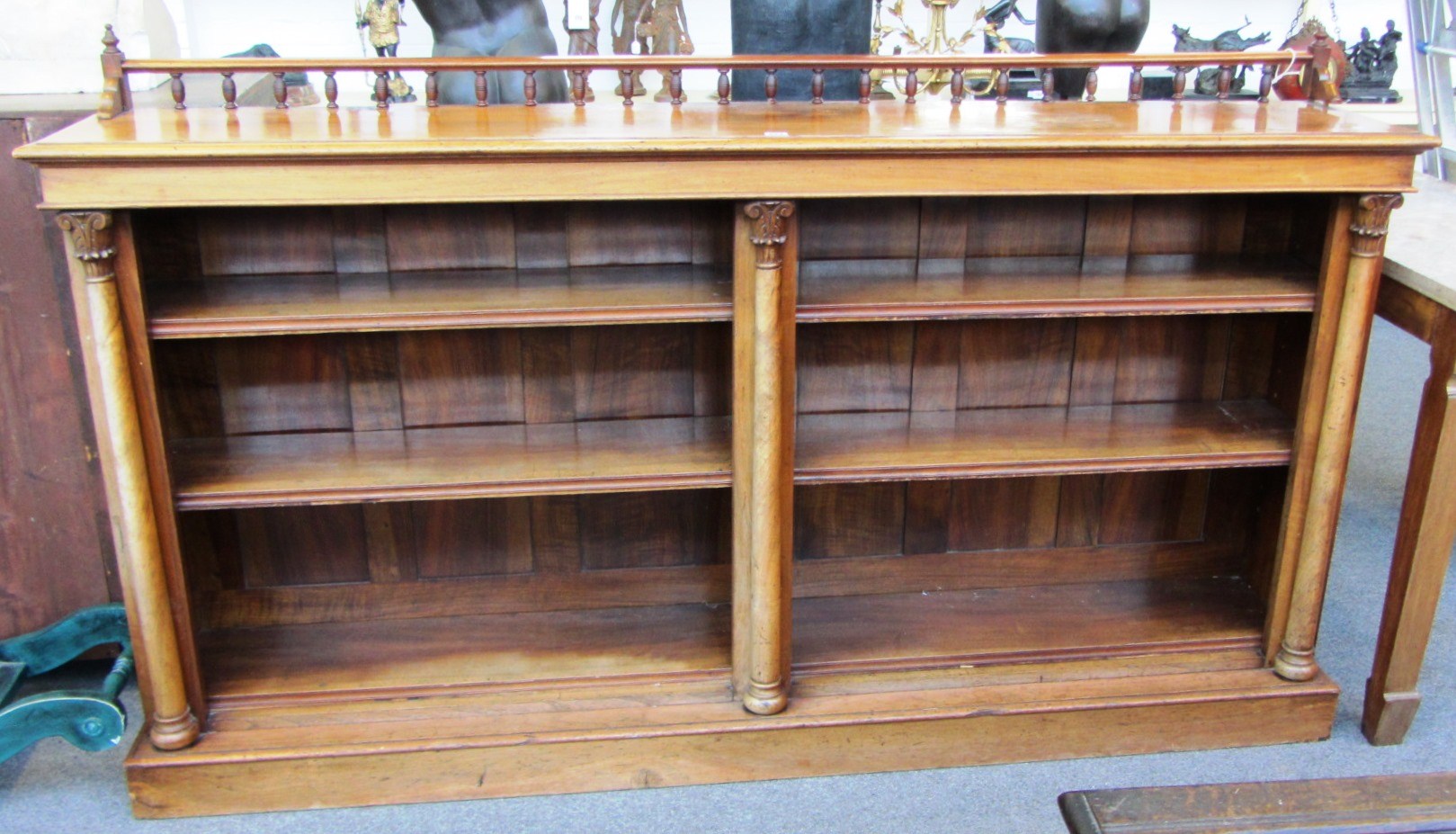 Appraisal: A Victorian mahogany floor standing two section open bookcase with