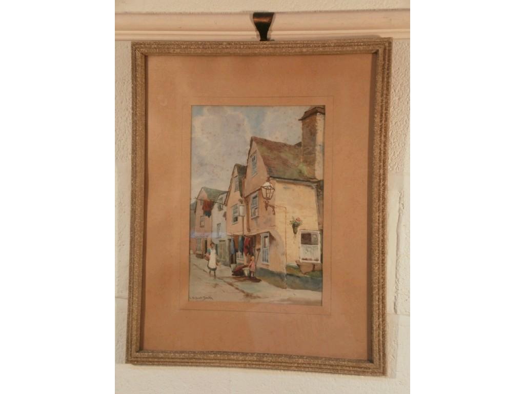 Appraisal: E H Burt-Smith Street scene with figures watercolour signed cm